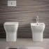 Wc filomuro bianco lucido senza brida con scarico multiplo  Plana